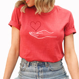 Hand Holding Heart Graphic Tee | Scatter Kindness | Be Positive | Kindness | Be Kind
